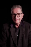 Slika glumca Tom Robinson