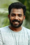 Slika glumca Azees Nedumangad
